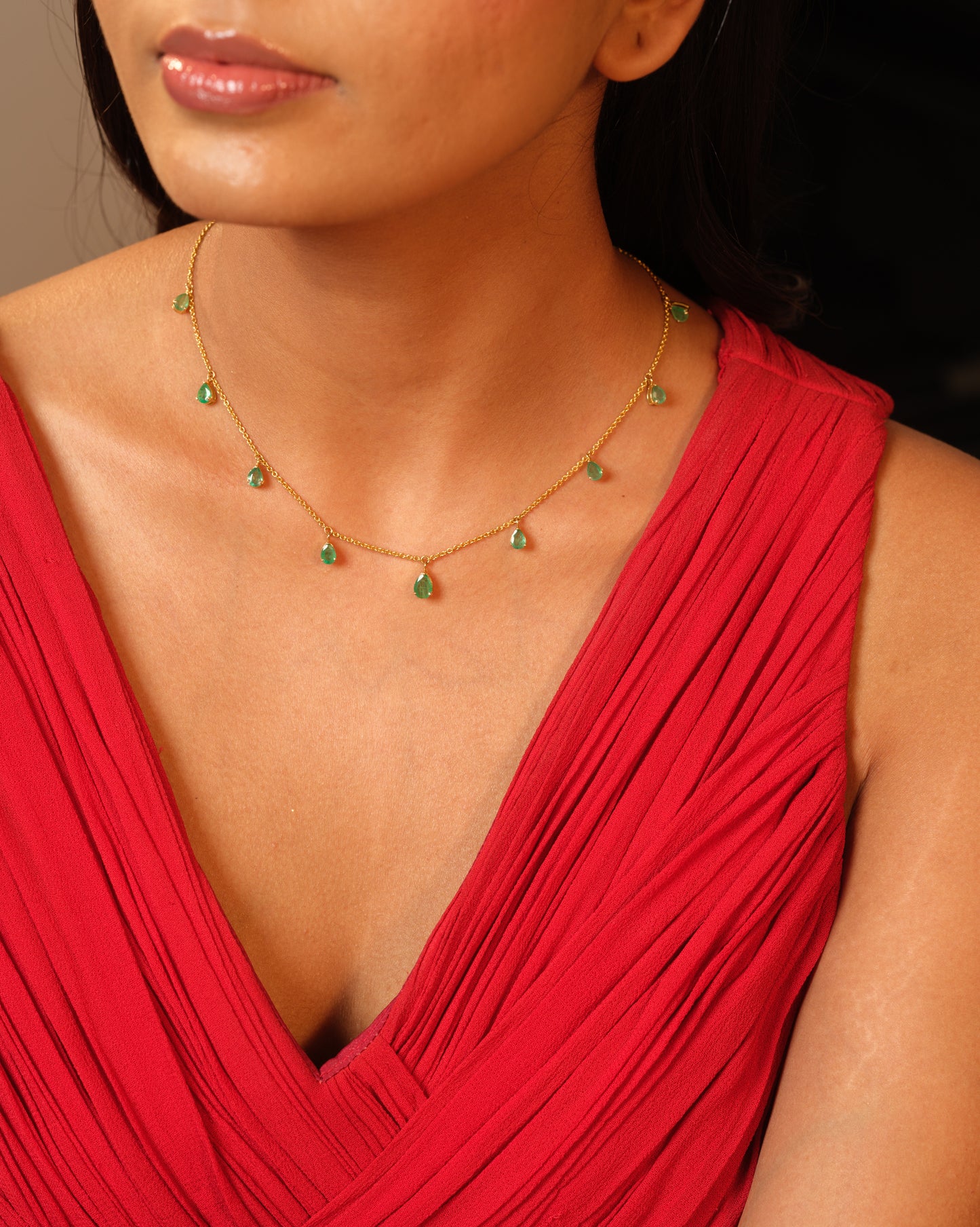 DANGLING EMERALDS